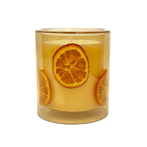 This fresh citrus scent helps alleviate symptoms of depression, anxiety, anger, and promotes relaxation. Tangerine serves as an aphrodisiac, natural bug repellent, and studies even suggest this scent may aid in improving cognitive function. The cotton wick allows for a clean and bright flame, featuring a lovely glow of dried citrus slices as it burns. Enjoy over 70 hours of burn time.