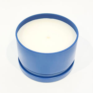 Hand poured 6 ounce soy wax candle with cotton wick. Deep Blue Sea scent. Comes in a peach tin with lid.