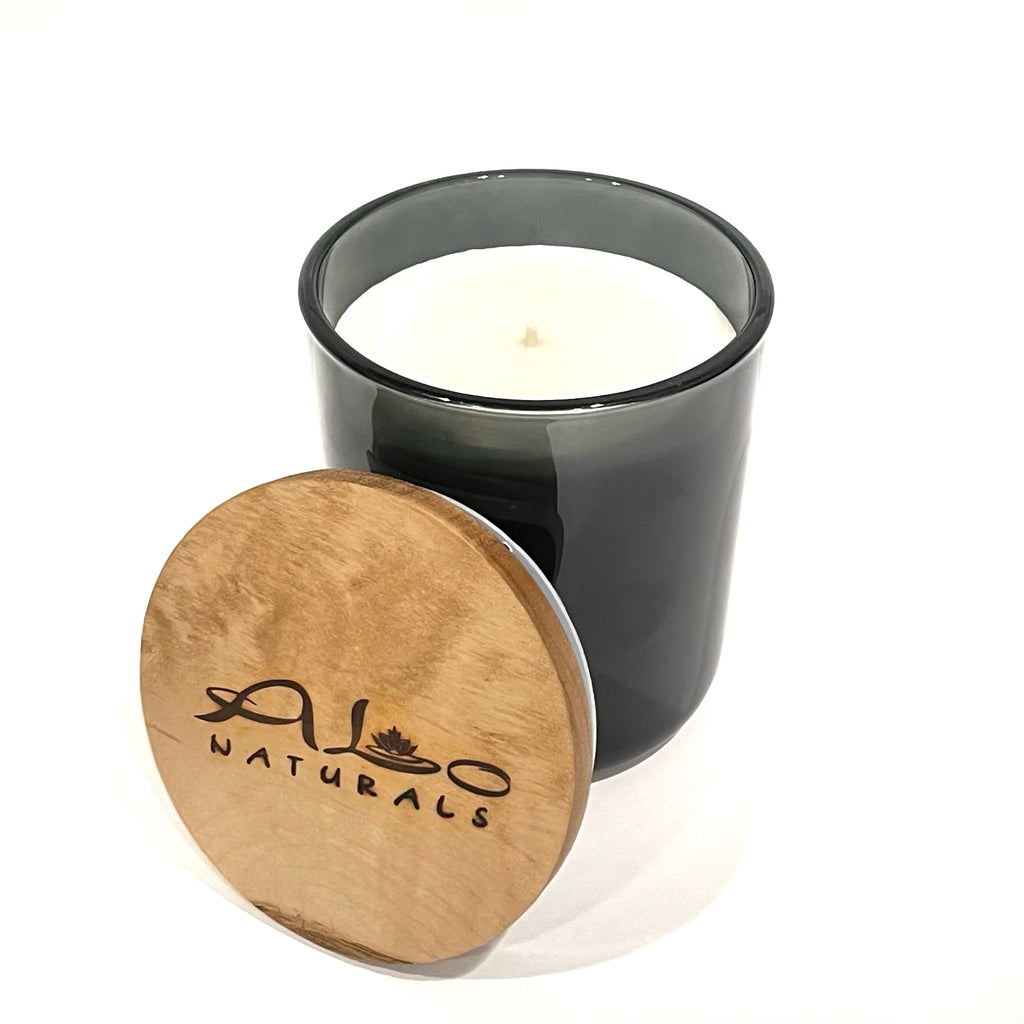 This masculine fragrance has notes of woody sandalwood, patchouli, amber, oud and rich resins.  Fresh and Clean!  Hand poured with 13 ounces of soy wax in a translucent gray glass vessel with maple wood lid and a cotton wick for a bright flame.  Enjoy over 75 hours of burn time.