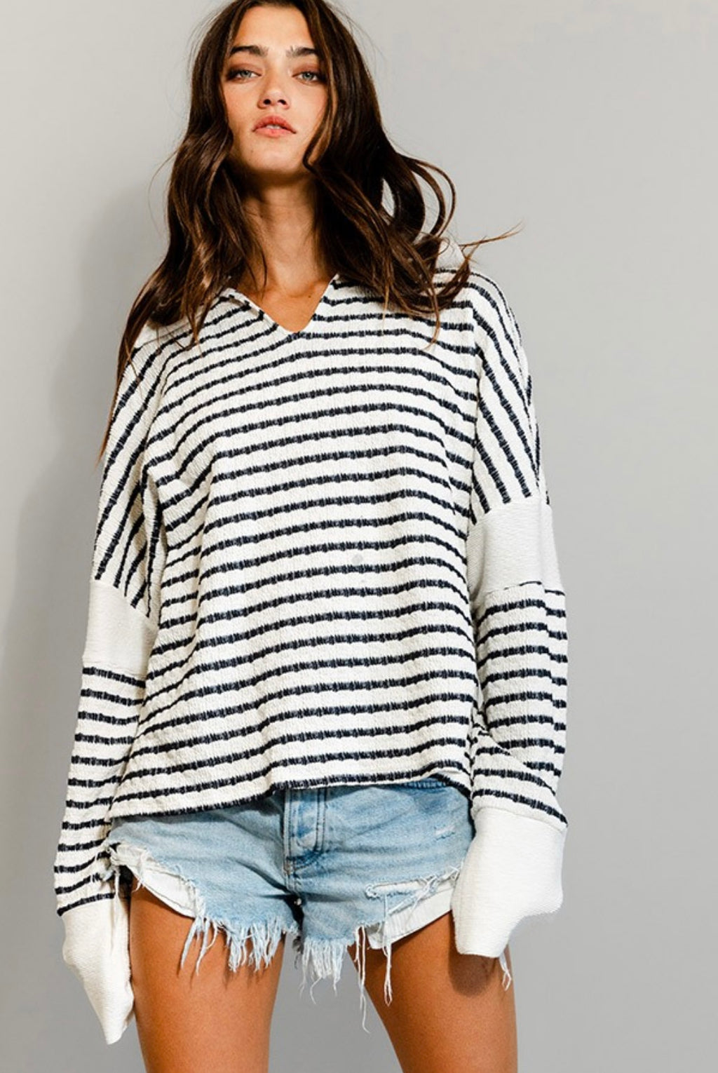 Black & white striped pullover top.