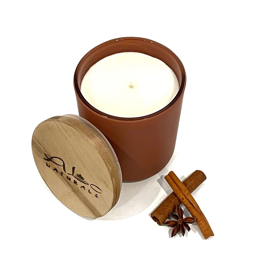 Spicy Chai scent! Hand poured with 100% soy wax. This 13oz candle features a beautiful wood maple wood lid and natural cotton wick, for that cozy warm winter feel. 