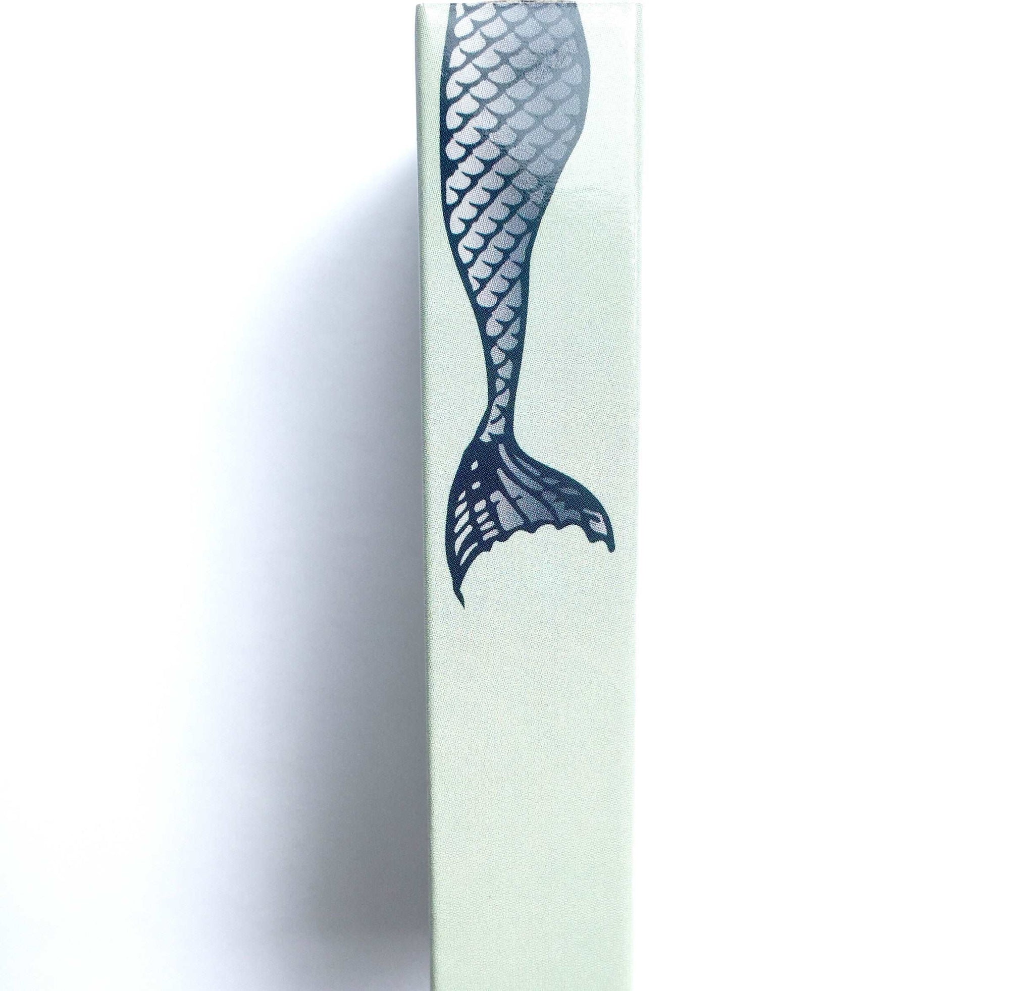 These Mermaid Brand jumbo matches are perfect for lighting our hand poured soy candles!  These decorative matches are a lovely addition to enhance any home décor.  Our designer match boxes are reusable, and each comes with 50 matches tipped in blue.