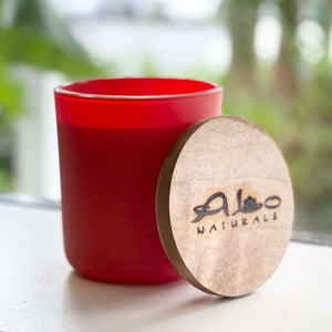 Blood Orange soy candle.  13oz of hand poured soy wax in a deep orange glass container with a cotton wick and maple wood lid.  Over 70 hours of burn time!