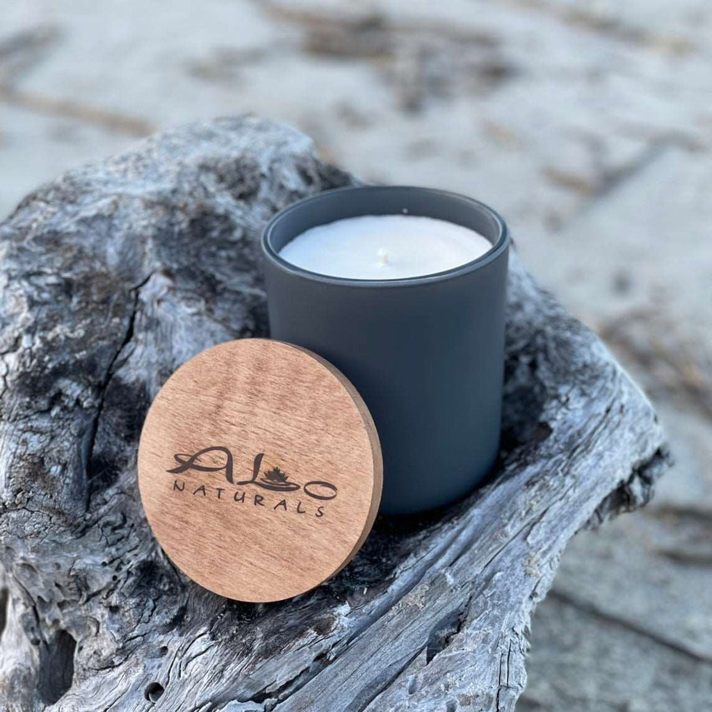 13oz hand poured soy candle. Driftwood scented for an earthy feel. It comes in a beautiful stonewashed color. Cotton wick. Comes with a maple wood lid. Gets over 70 hours of burn time!