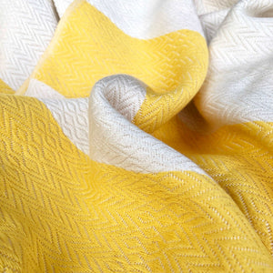 This gorgeous yellow boho style cover-up is hand loomed with 30% bamboo and 70% natural Turkish cotton.  So soft and cute for any summer occasion.  Wear it to the beach, pool, or as an extra layer to your summer outfits!  Yellow.