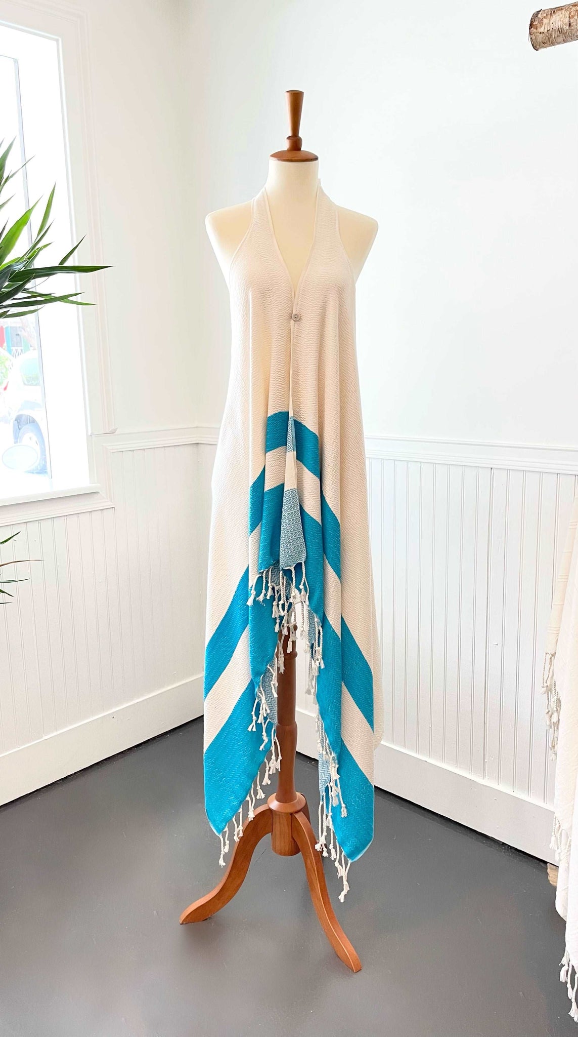 This gorgeous boho style cover-up is hand loomed with 30% bamboo and 70% natural Turkish cotton. So soft and cute for any summer occasion. Wear it to the beach, pool, or as an extra layer to your summer outfits!  Turquoise.