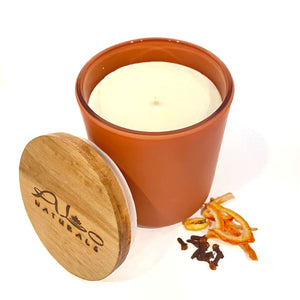 Orange Rind & Clove.  13oz hand poured soy wax candle with a cotton wick.  Enjoy 75 hours of burn time!  