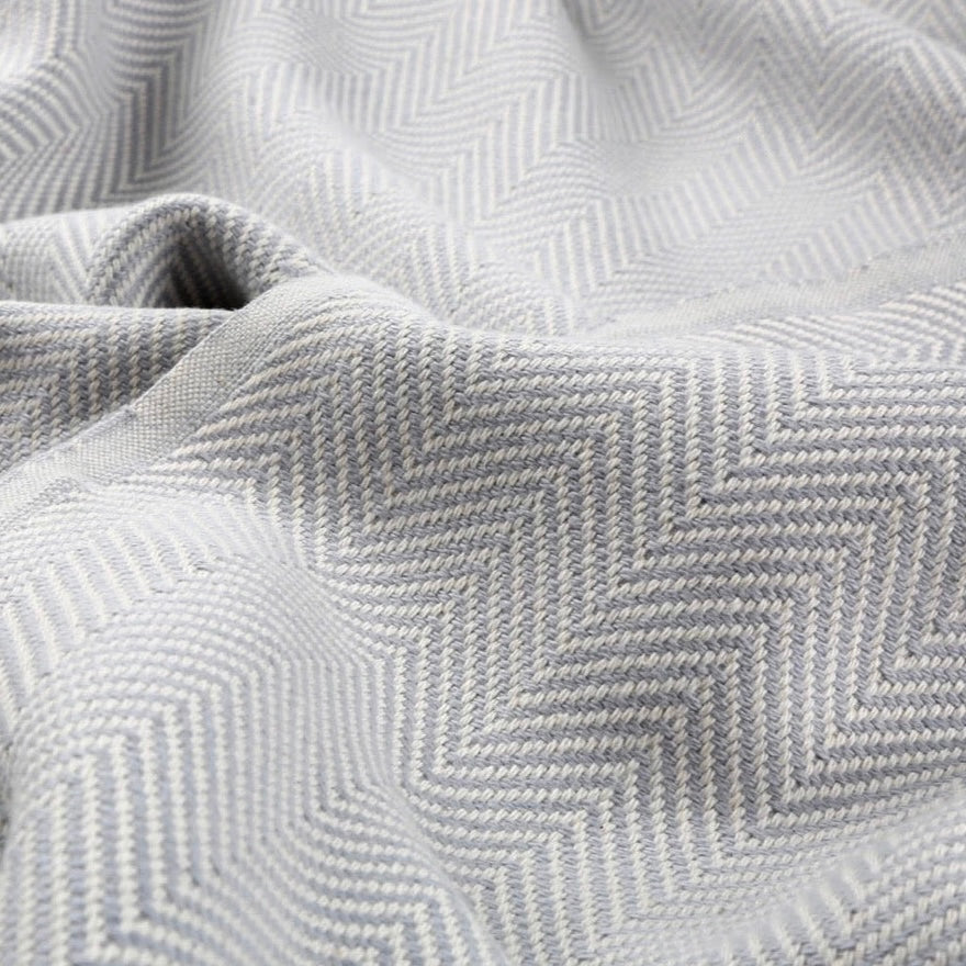 This beautiful throw blanket is hand loomed in a herringbone pattern with 100% Turkish Cotton. Known for its softness, comfort, light weight, hypoallergenic, and antimicrobial properties. Can be used as a throw blanket on a bed, couch, picnic, or even at the beach! Get ready to stay warm and comfy! Fair trade. Queen size.