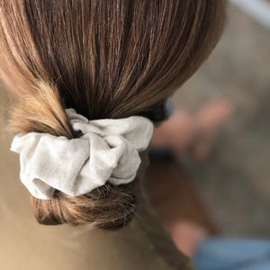 These beautiful linen scrunchies are hand sewn and come in two natural tones.  They are high quality and match every outfit!