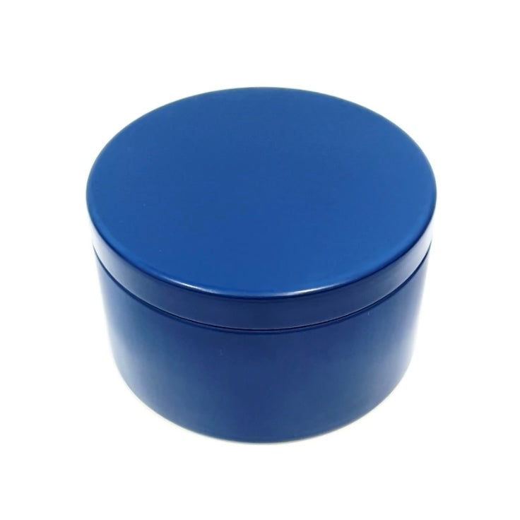 Hand poured 6 ounce soy wax candle with cotton wick.  Deep Blue Sea scent. Comes in a peach tin with lid.