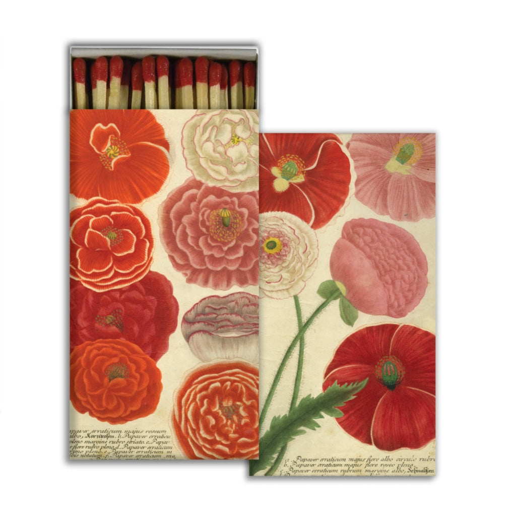 Poppy match box.  A quintessential article of daily use, our Match Boxes flaunt unique designs with coordinating match tips. Sweet as a hostess gift, a perfect pairing to a candle and always an eye catching pop of graphic decor. Safety matches, 50 sticks per box.  Match boxes measure 4.5x2.5x.75.