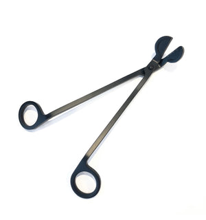 Trimming your wick in between burns will allow for a cleaner burn, even flame, and a longer lasting candle.  Our metal wick trimmers clip wicks to the perfect length even in a deep container.  Black.
