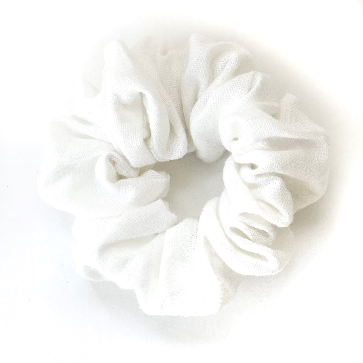  These beautiful linen scrunchies are hand sewn and come in two natural tones. They are high quality and match every outfit!  White