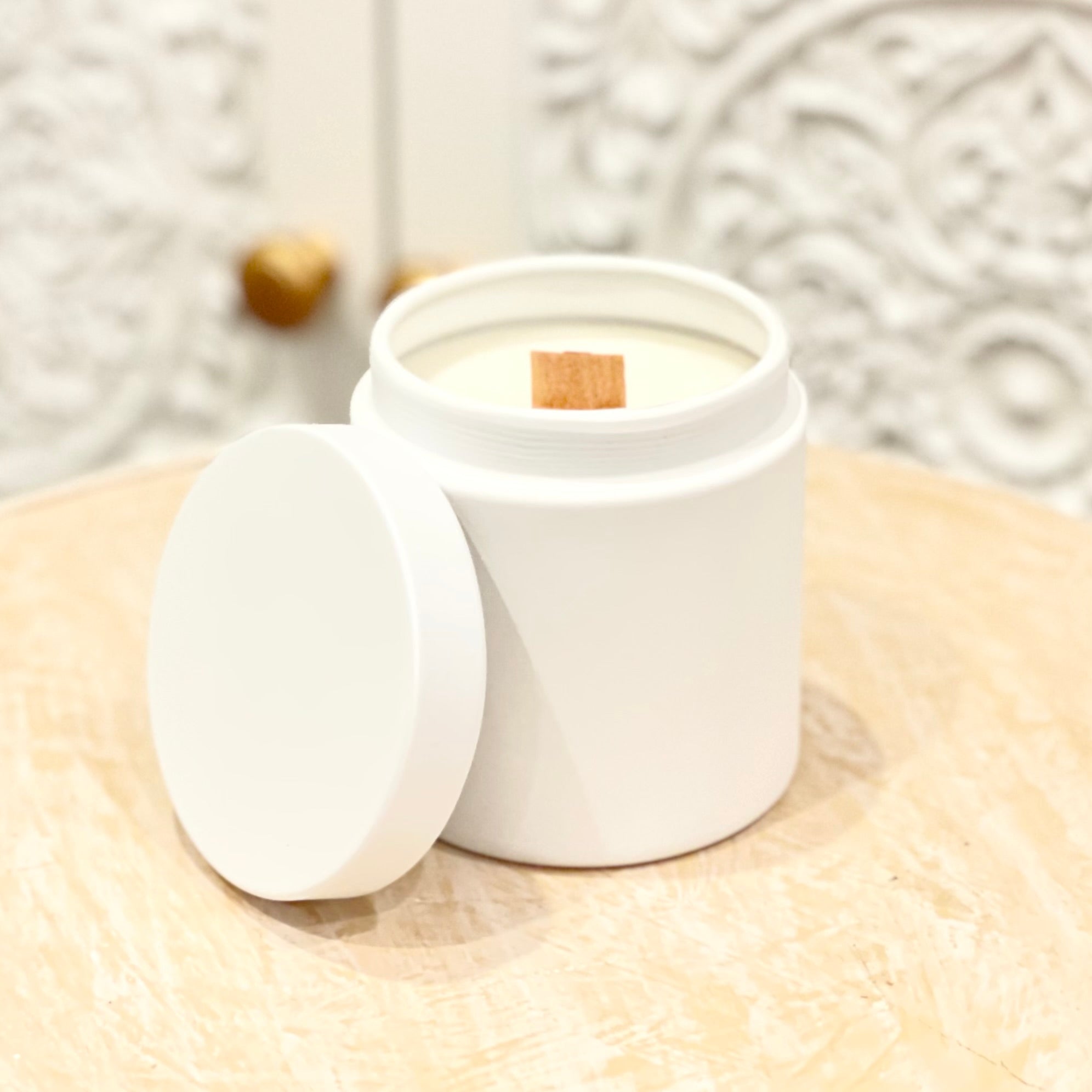 This beautiful white tin vessel is packed with 10 ounces of soy wax, a wooden wick that crackles as it burns, and a lid to top it off.  It is scented with a lovely Jasmine floral aroma to calm the mind, body, and soul.  Great addition to any space and hand poured by us.